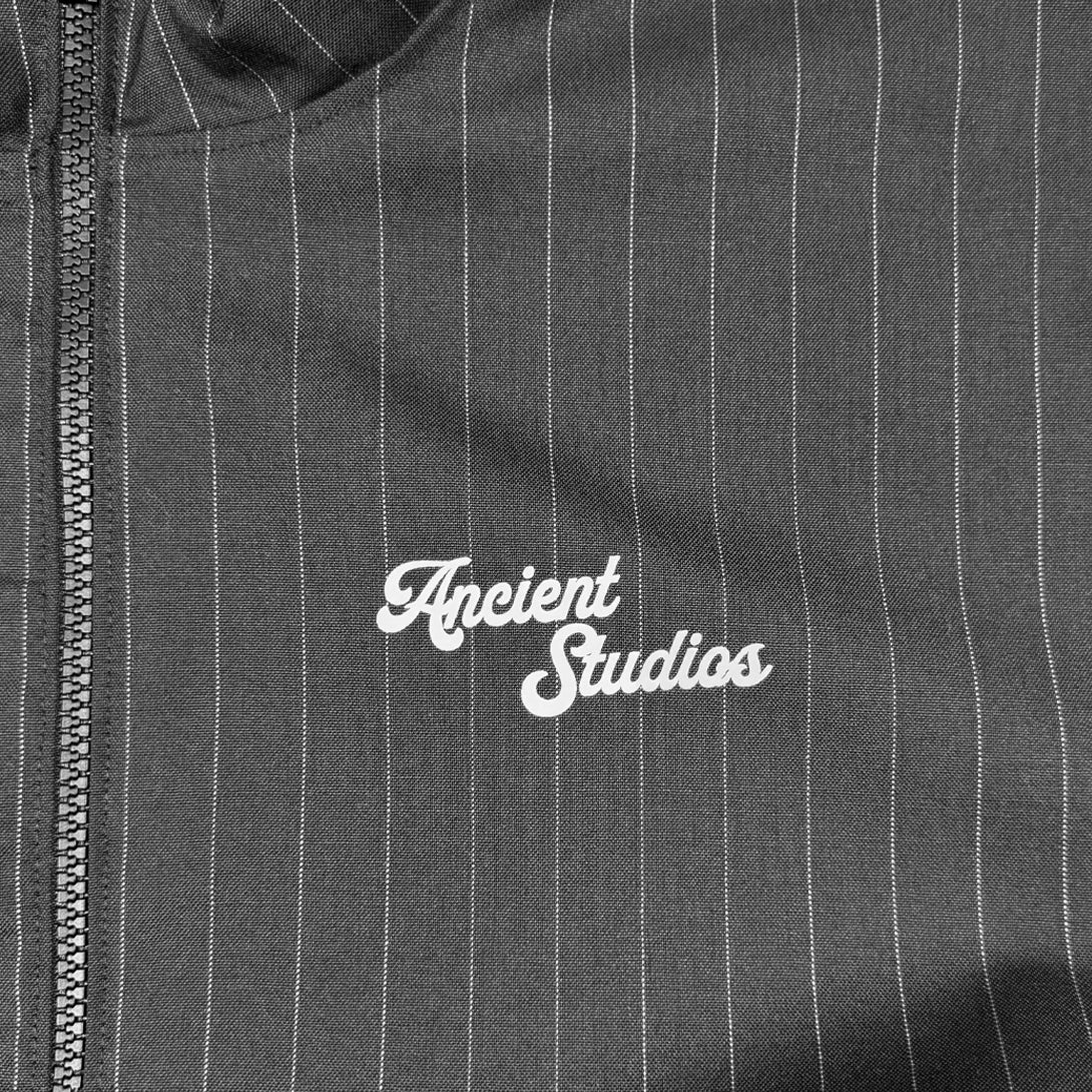 The Pinstriped Track Jacket